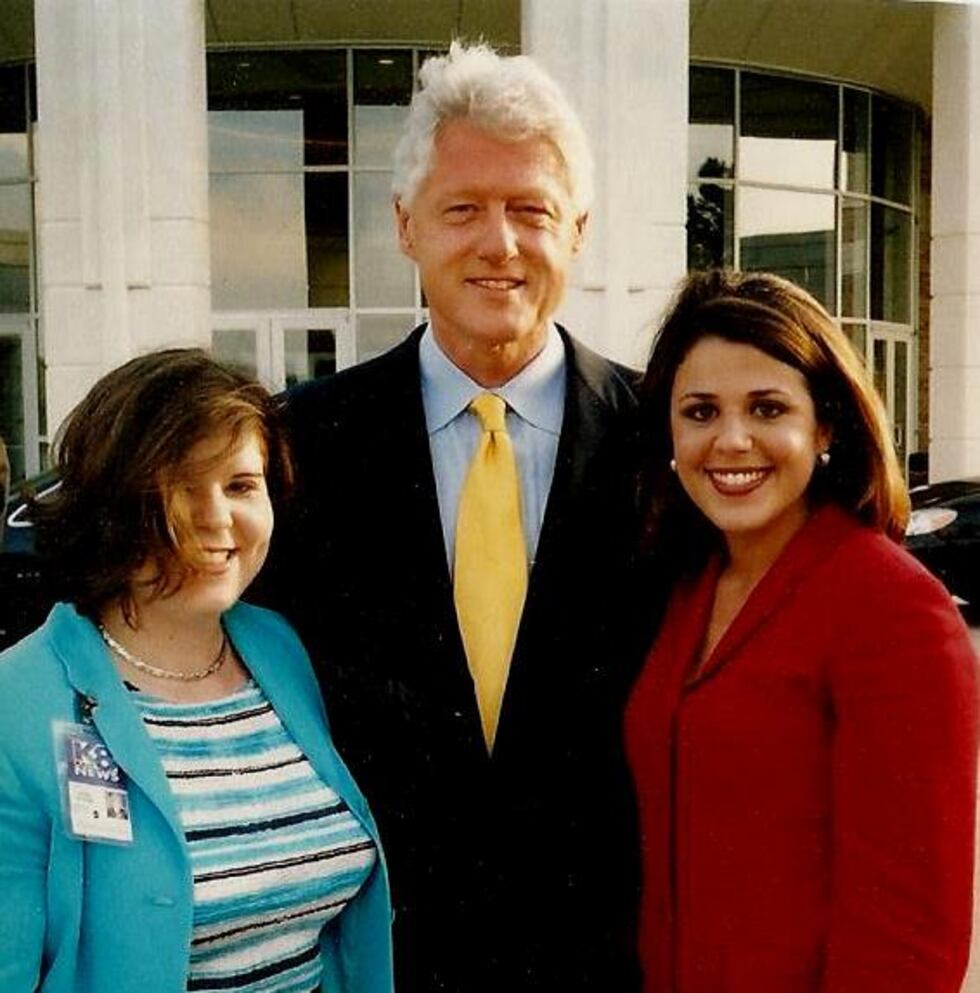 Former President Bill Clinton flanked by KAIT photographer Laura Gunter and former KAIT...