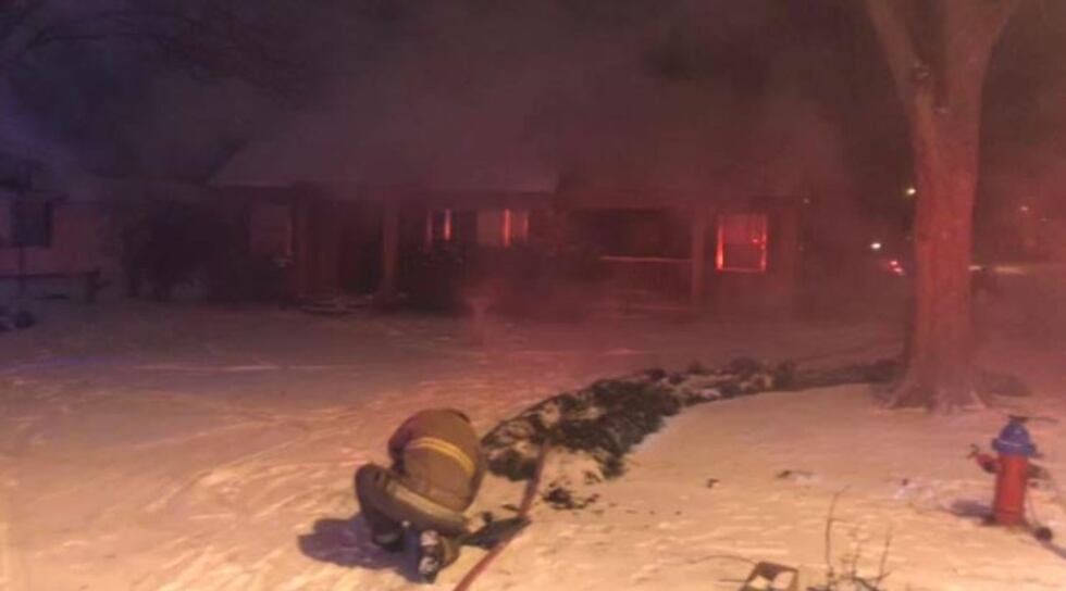 Firefighters battle flames, freezing temperatures