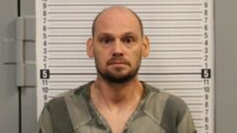 Authorities arrested a man after they said he was found in bed with a minor.