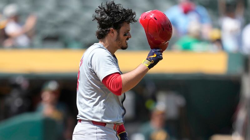 Cardinals lose finale in Miami, Arenado exits after hit by pitch on right elbow