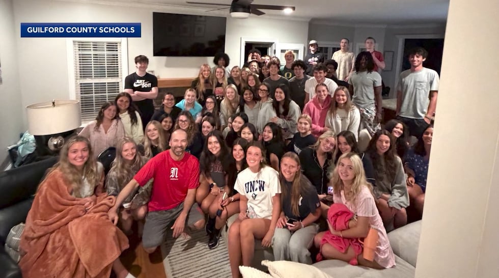 Dozens of high school seniors showed up at the home of their principal, Dr. Brian Muller...